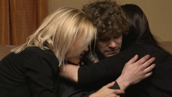 Family Embracing In a Hug During Intervention