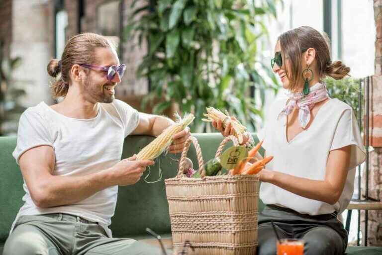 couple with fresh vegetables at home
