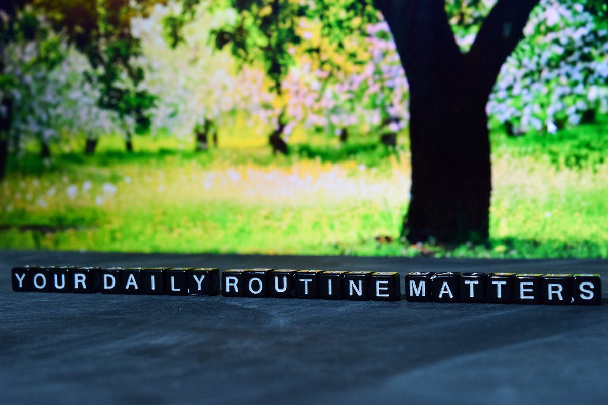 your daily routine matters on wooden blocks